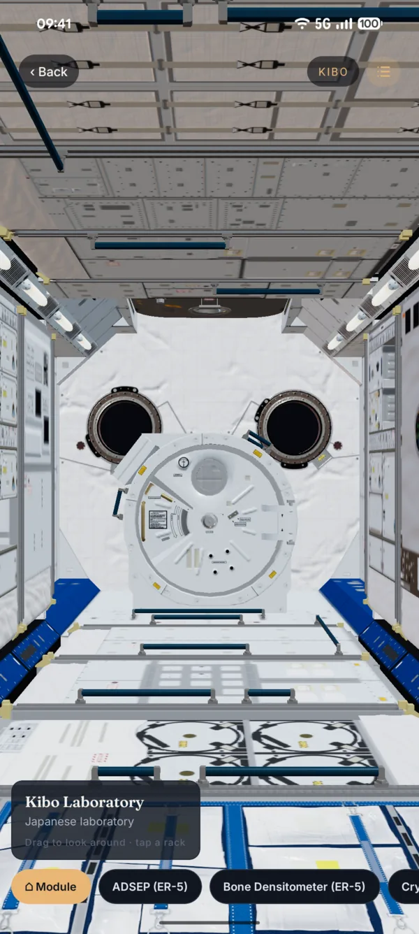 Subpoint 3D interior view of the Kibo laboratory module with experiment chips.